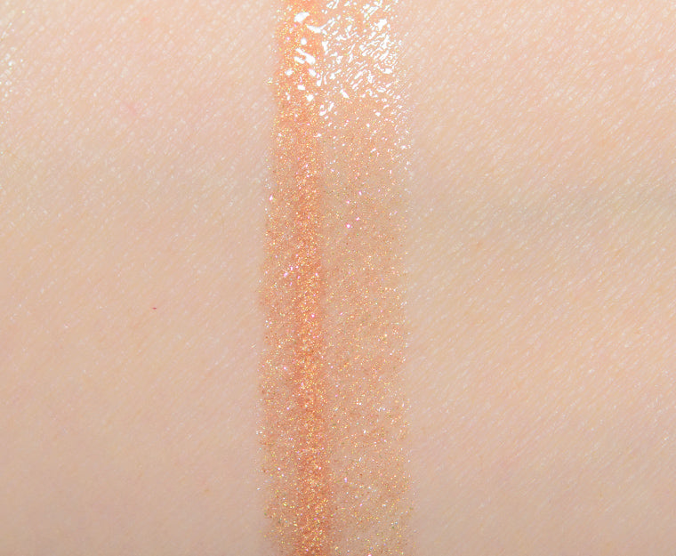 Becca Glow Gloss in CHAMPAGNE CREME
