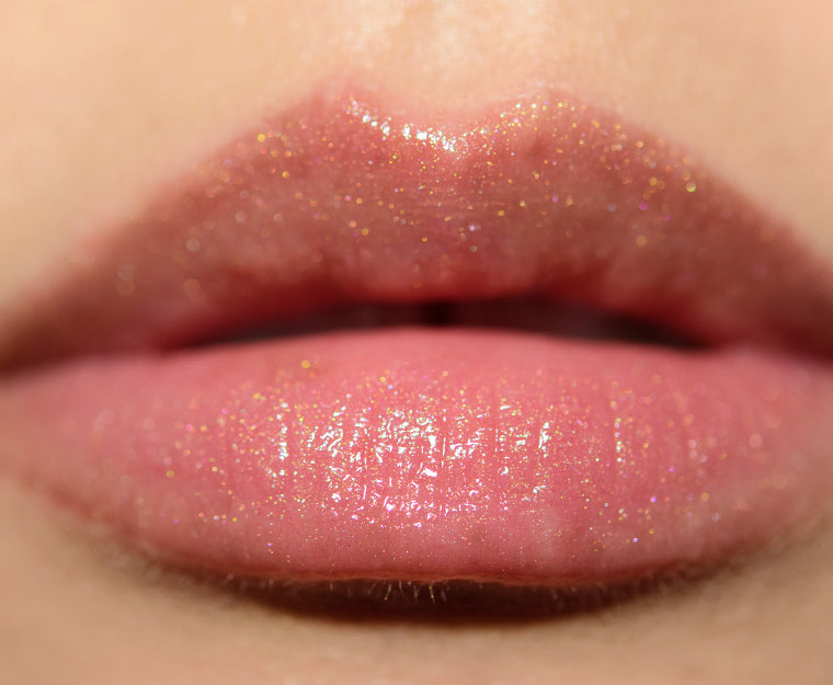 Becca Glow Gloss in CHAMPAGNE CREME