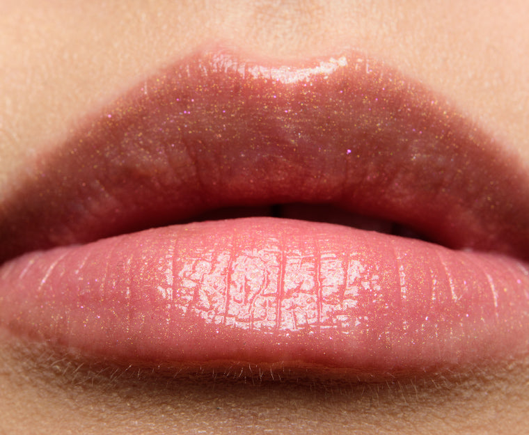 Becca Glow Gloss in CHAMPAGNE CREME